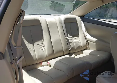 1999 Toyota Camry Solara Sle z USA, uszkodzony, nr VIN 2T1CF22P1XC210933